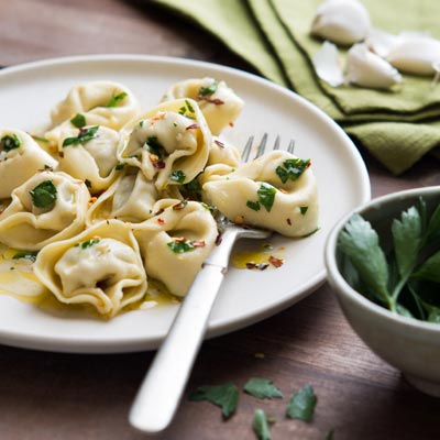 Sweet Italian Sausage Tortelloni with Parsley-Garlic Sauce