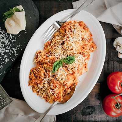 Baked Four Cheese Ravioli in Marinara Sauce