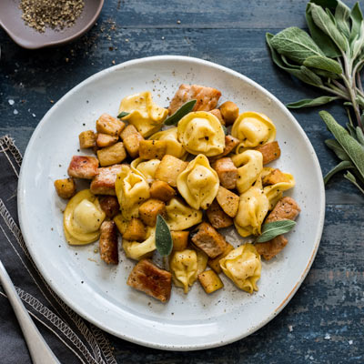 Three Cheese Tortellini with Sautéed Pork, Apples and Sage